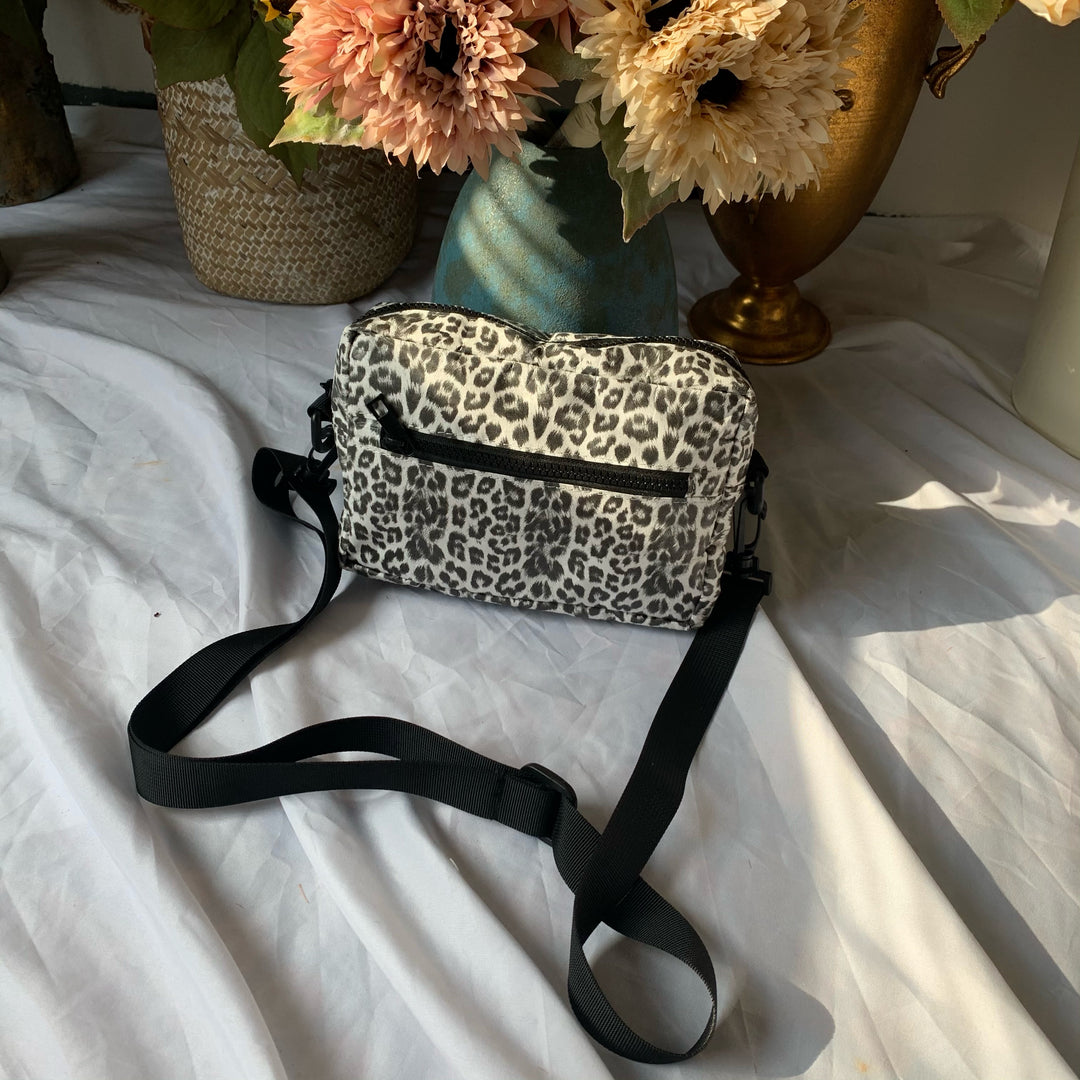 leopard & newspaper bag